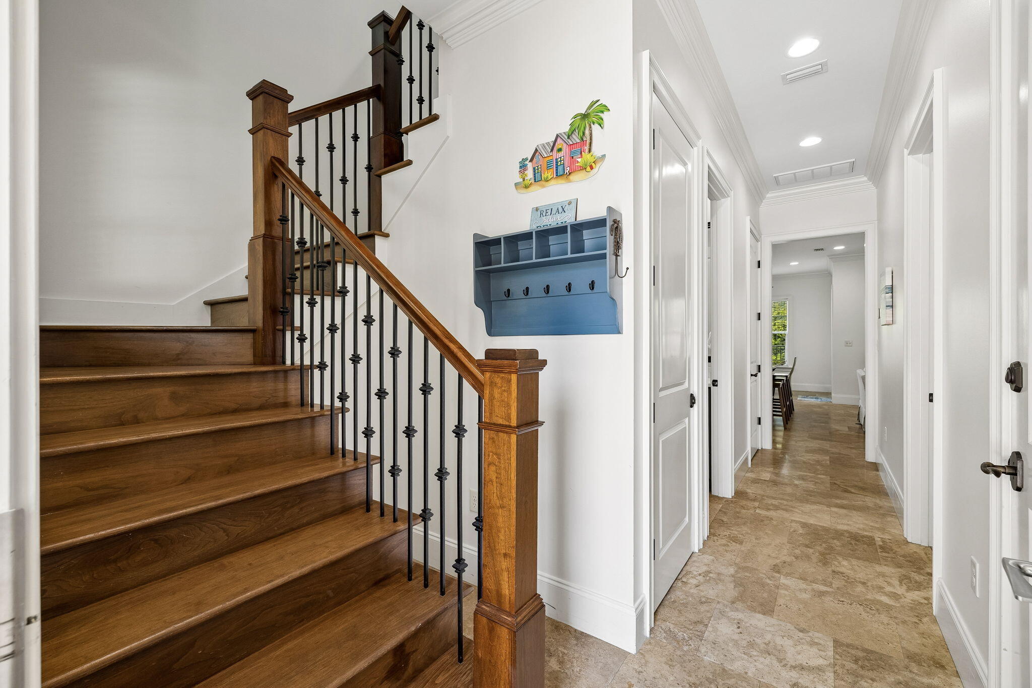1973 Baytowne Loop Miramar Beach, FL 32550 - Photo 5 of 38 a view of hallway with stairs and wooden floor
