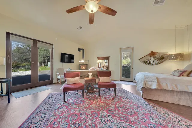 a view of a very nice looking room with many windows