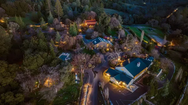 a view of balcony with wooden floor and outdoor seating