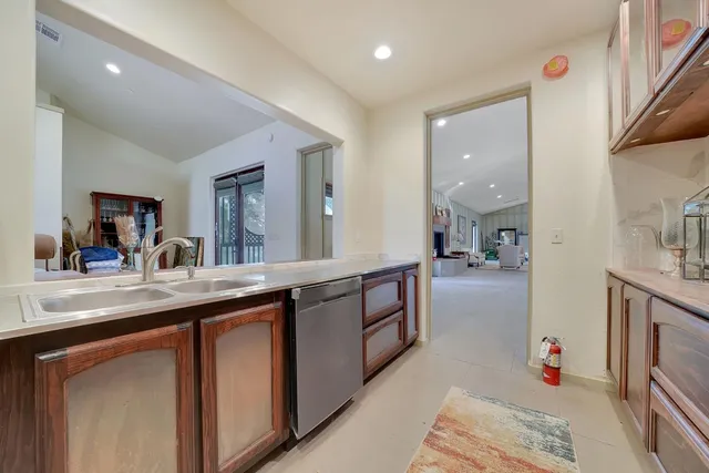 a bedroom with a bed couch and window