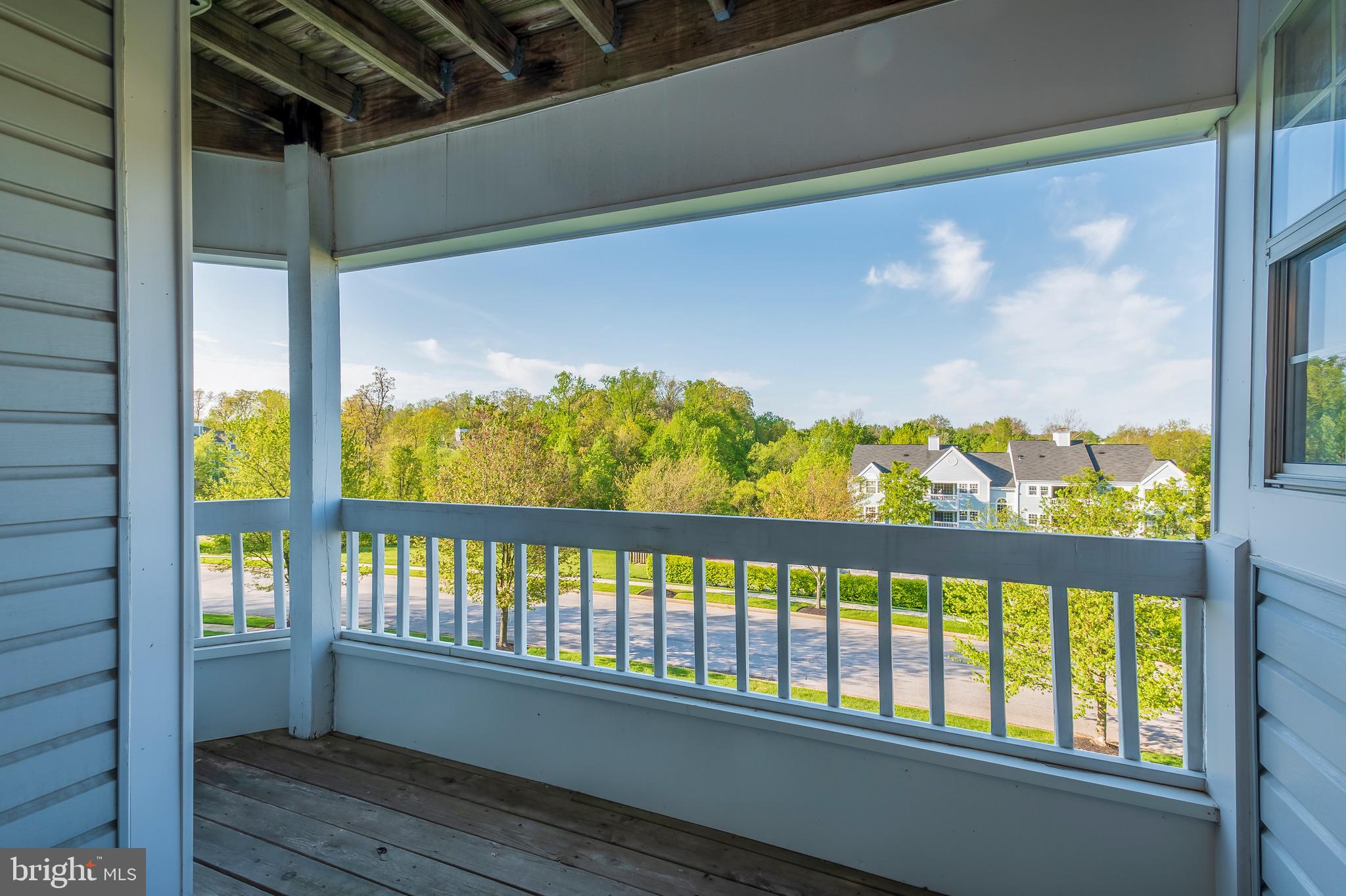 8382 Montgomery Run Road, Unit F Ellicott City, MD 21043 - Photo 20 of 22 Covered balcony big enough for a table and chairs