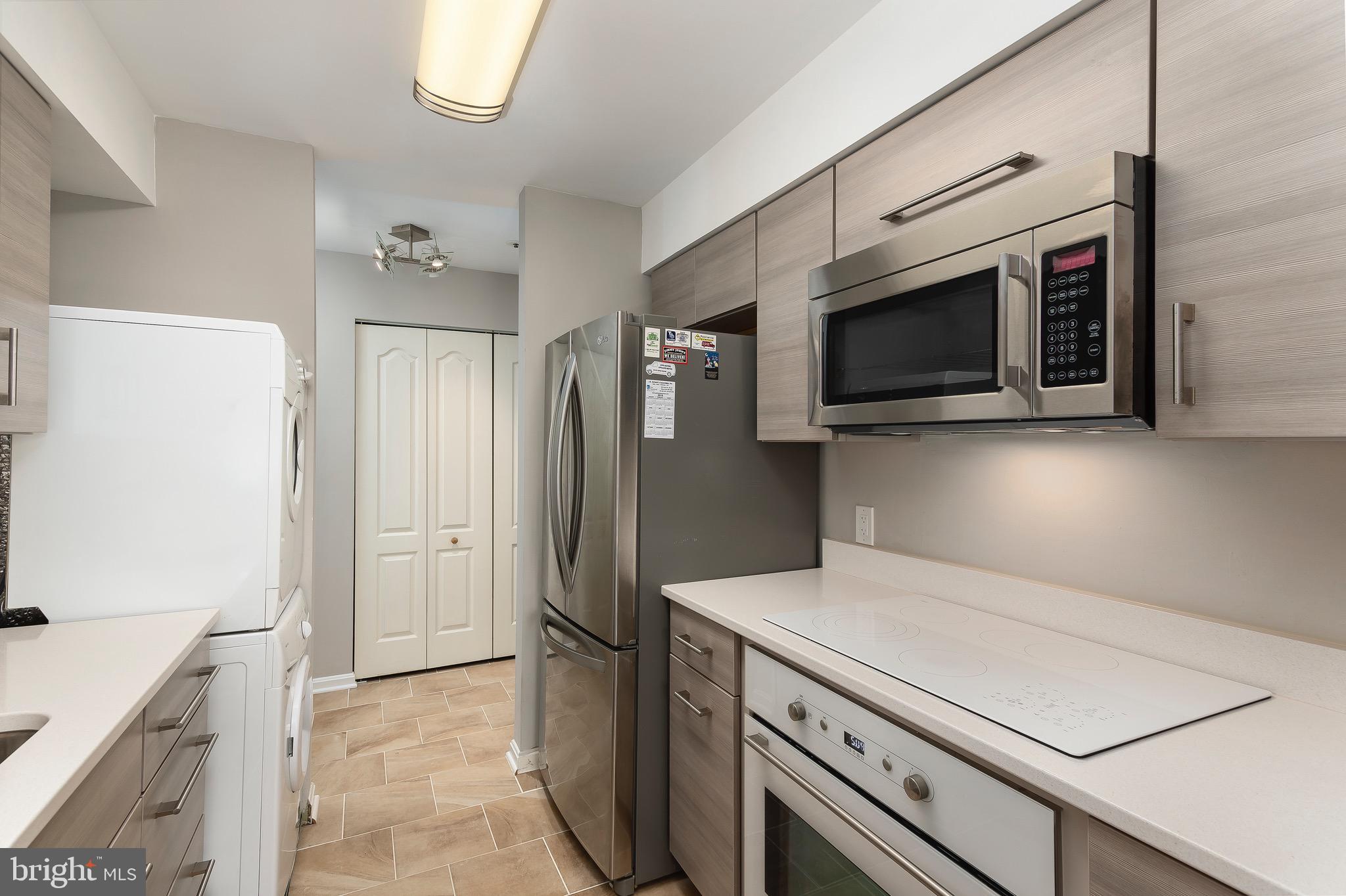 8382 Montgomery Run Road, Unit F Ellicott City, MD 21043 - Photo 3 of 22 Completely remodeled kitchen with custom cabinets