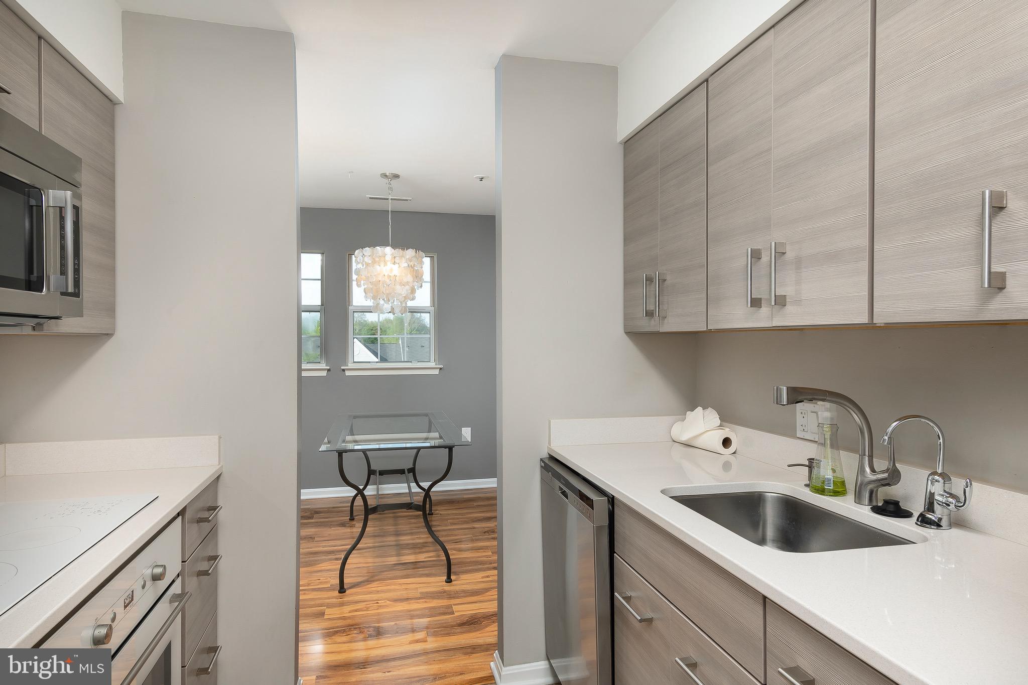 8382 Montgomery Run Road, Unit F Ellicott City, MD 21043 - Photo 5 of 22 Stainless appliances and lots of storage