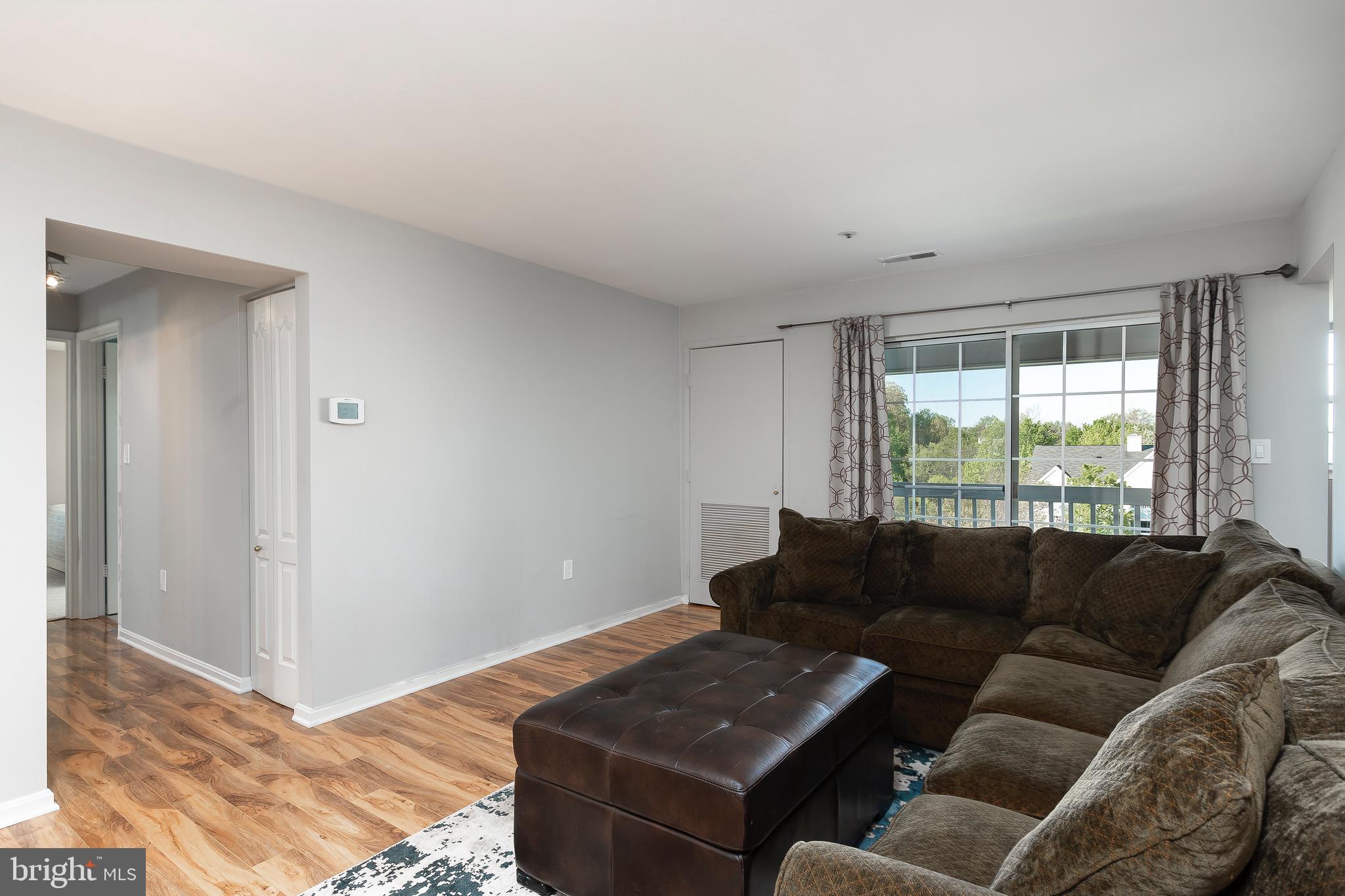 8382 Montgomery Run Road, Unit F Ellicott City, MD 21043 - Photo 8 of 22 Balcony access from living room