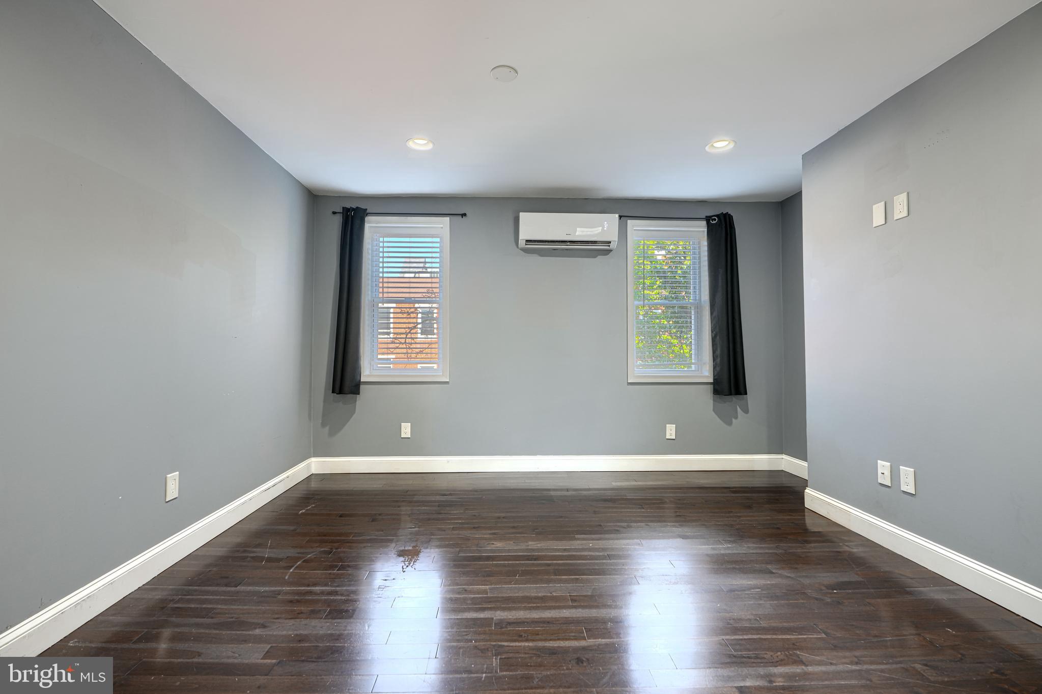 1106 Battery Avenue Baltimore, MD 21230 - Photo 26 of 36 a view of empty room with wooden floor and fan