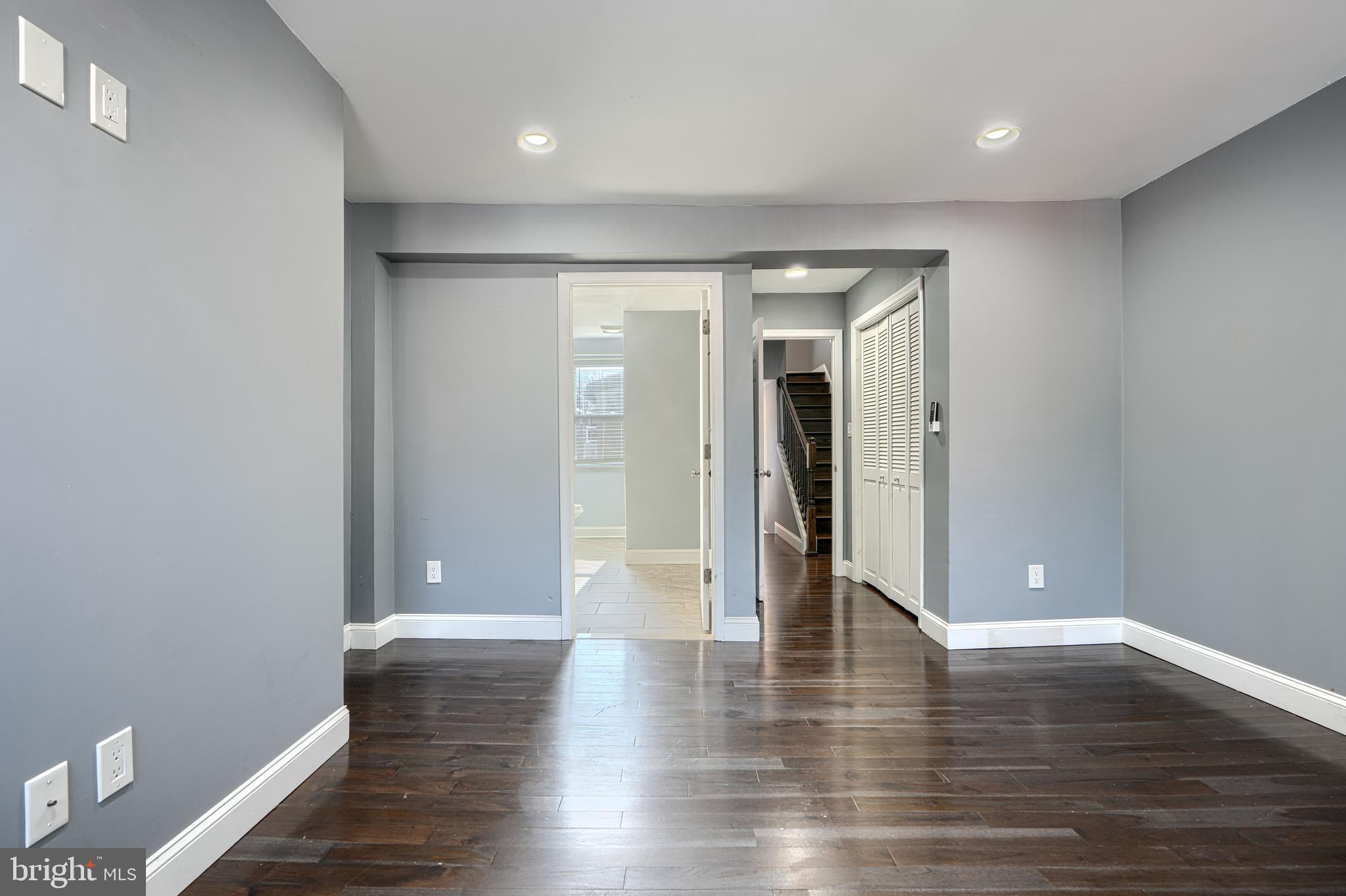 1106 Battery Avenue Baltimore, MD 21230 - Photo 27 of 36 a view of an empty room with wooden floor
