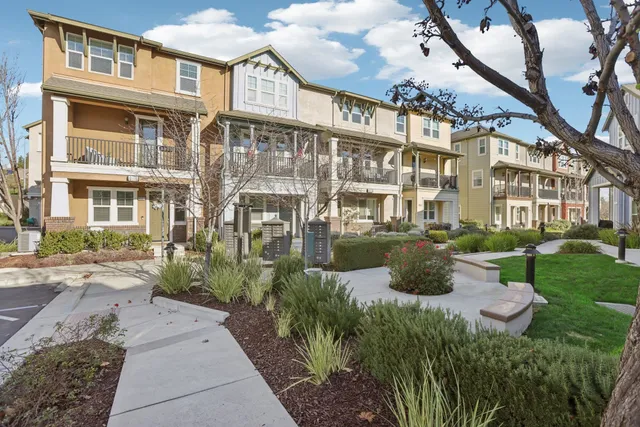 a view of a building with a garden
