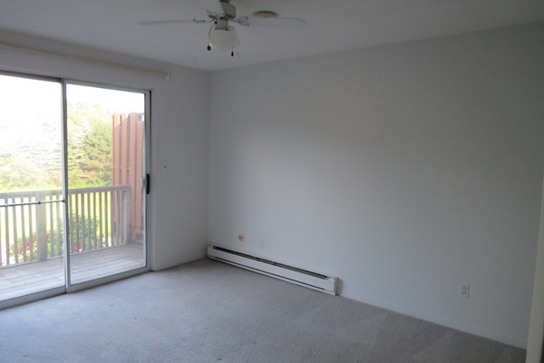 31 Liberty Square Road, Unit D Boxborough, MA 01719 - Photo 6 of 9 a view of room with a ceiling fan