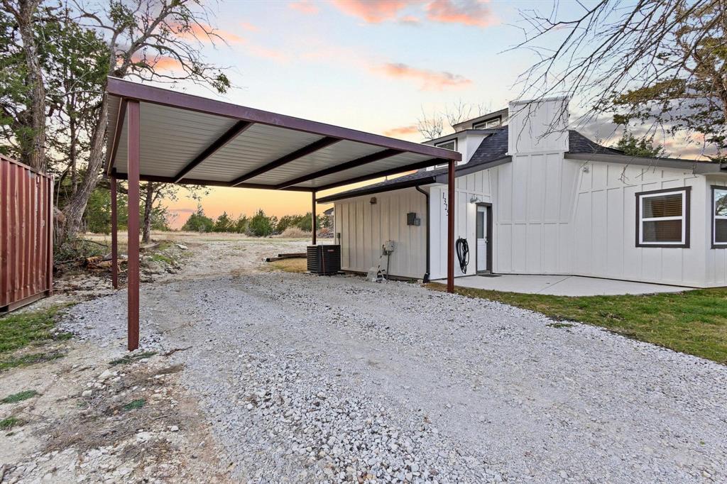1325 Reynolds Road Whitewright, TX 75491 - Photo 5 of 39 a view of a backyard