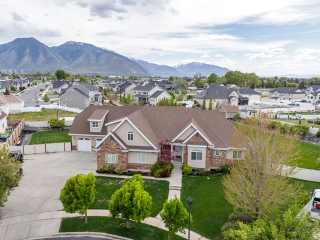 1355 West 1000 South Mapleton, UT 84664 - Photo 3 of 74 Aerial perspective of suburban area featuring a mountainous background