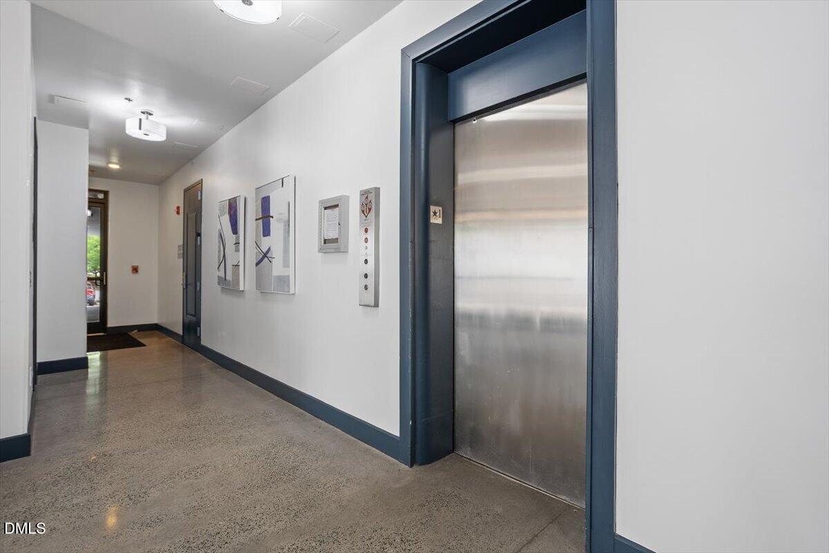 1300 St Marys Street, Unit 207 Raleigh, NC 27605 - Photo 27 of 31 a view of elevator with hallway