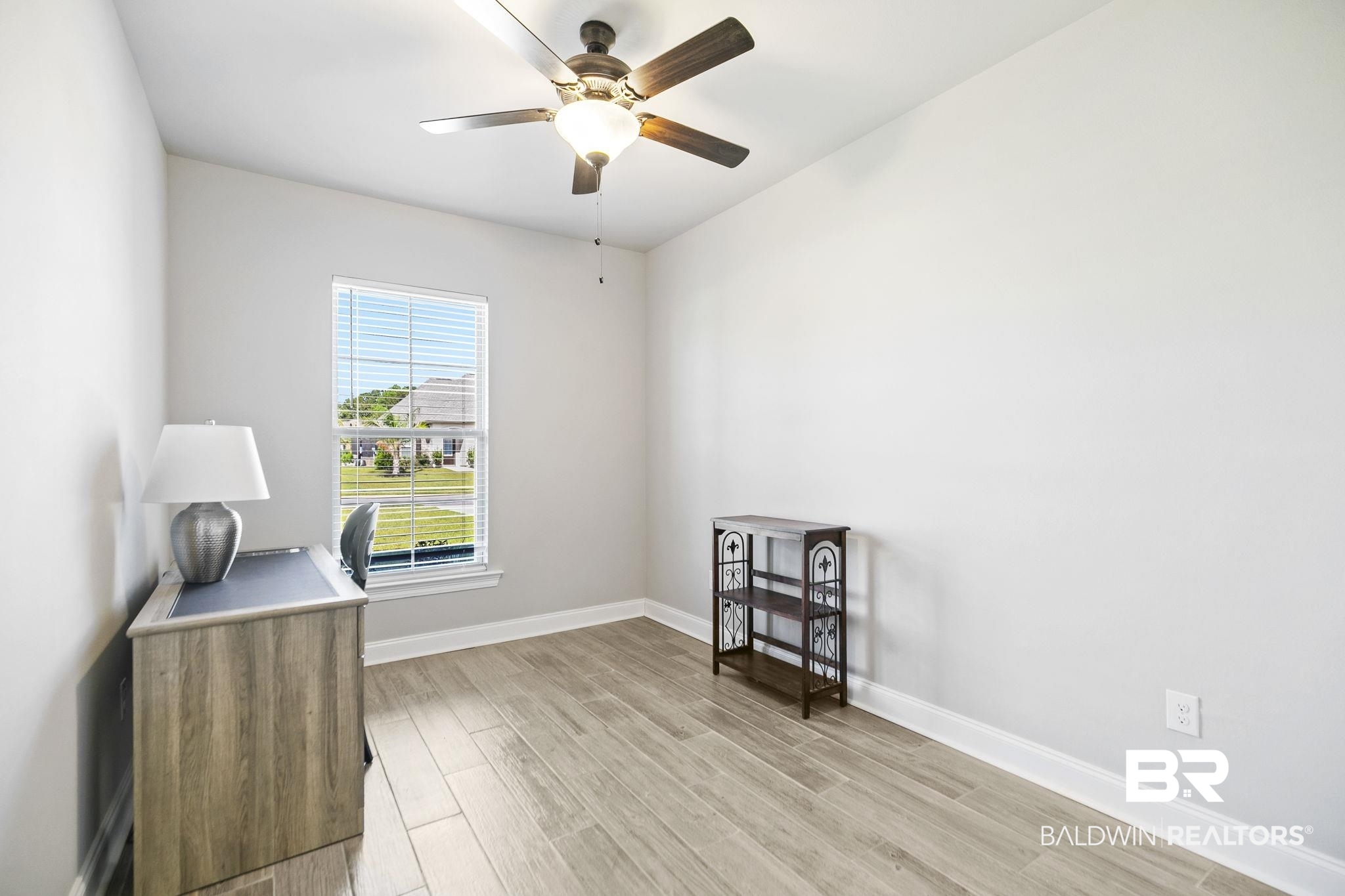 10140 Chipper Lane Foley, AL 36535 - Photo 38 of 72 Office area featuring ceiling fan and light wood-type flooring