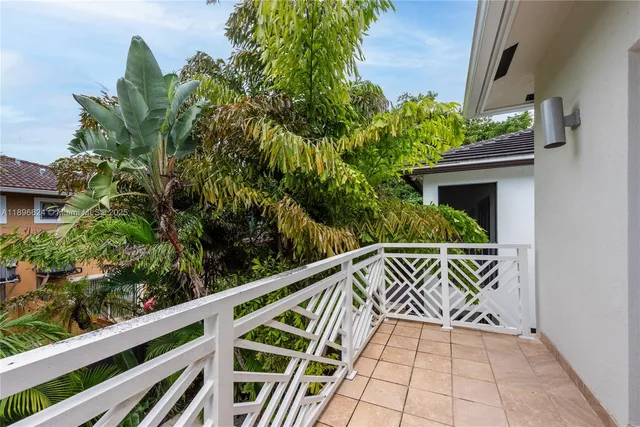 a view of stairs and potted plants