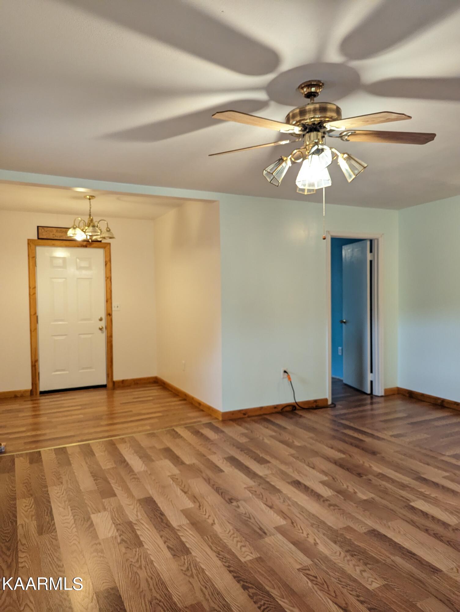 218 Price Road Lancing, TN 37770 - Photo 19 of 22 going out back and bedroom