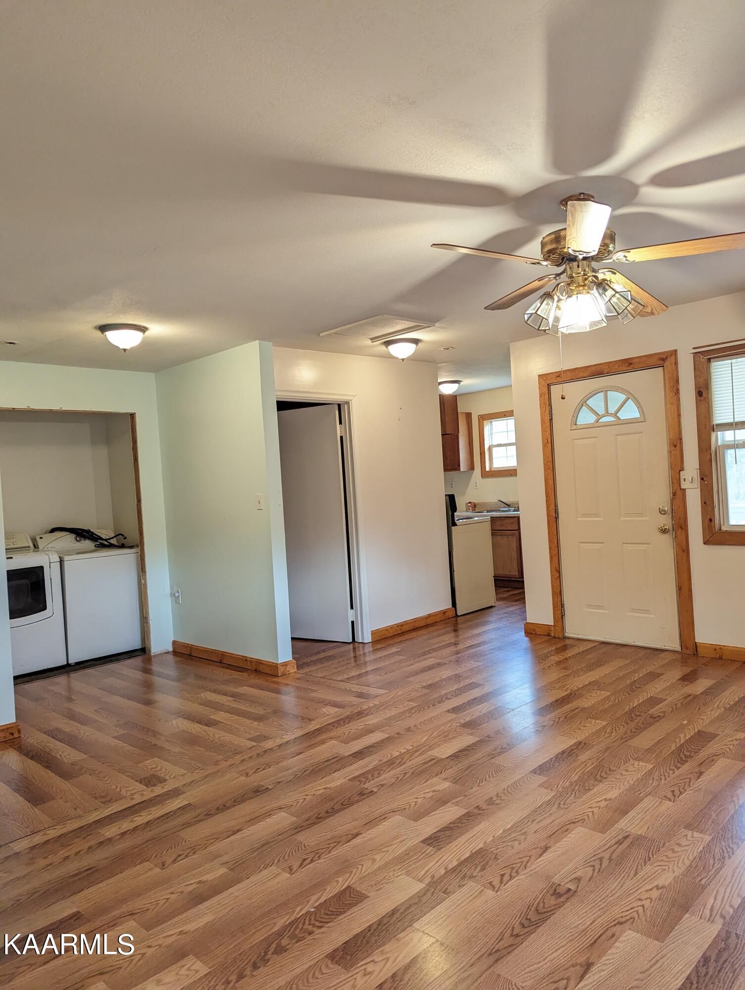 218 Price Road Lancing, TN 37770 - Photo 20 of 22 Kitchen and front entry