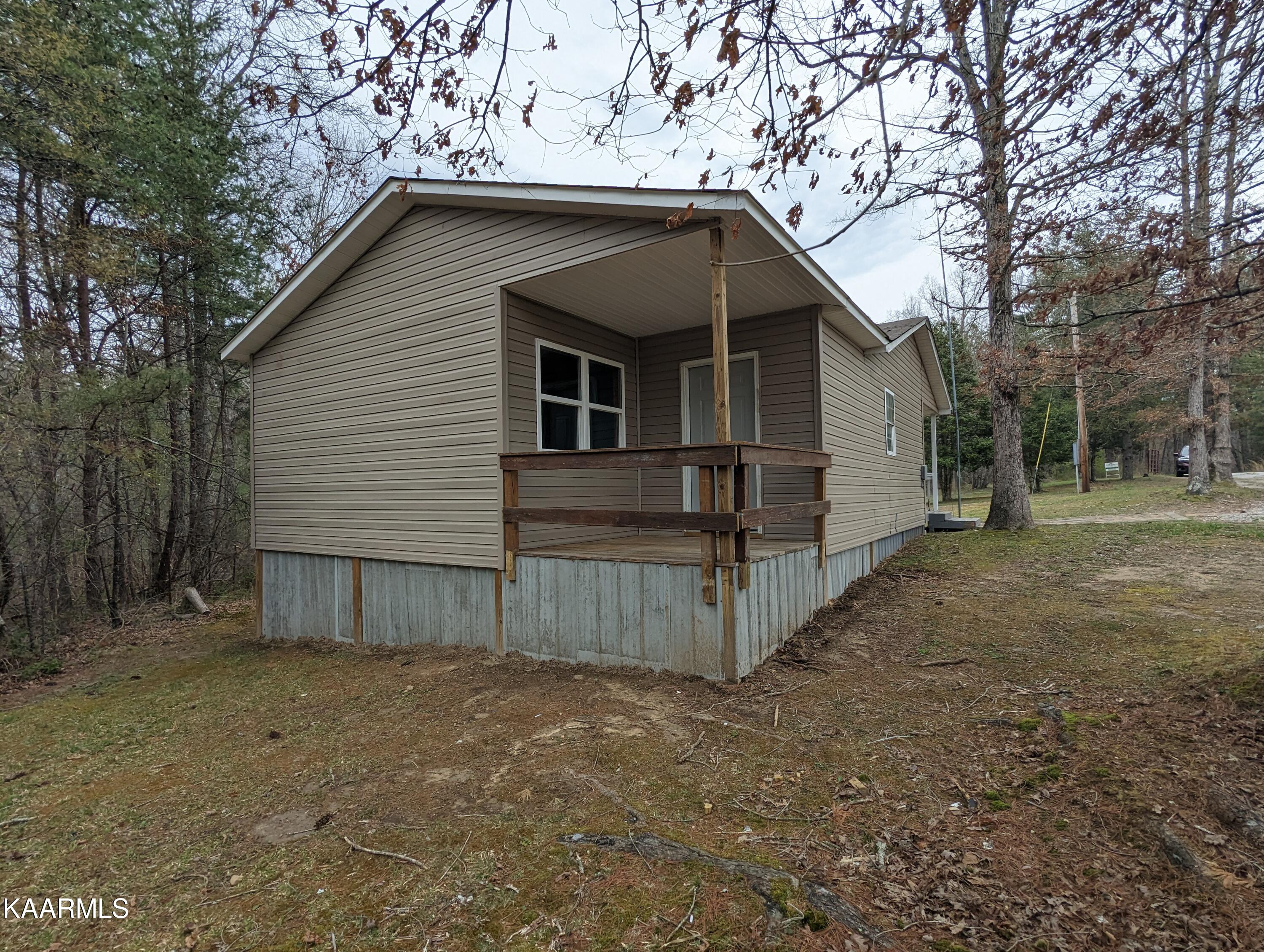 218 Price Road Lancing, TN 37770 - Photo 4 of 22 Back Porch