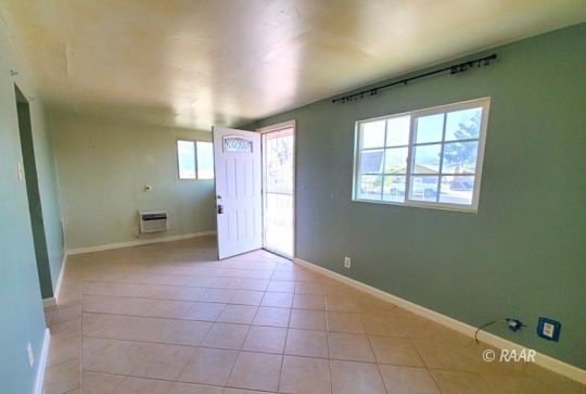 212 West Robertson Road Ridgecrest, CA 93555 - Photo 6 of 18 an empty room with windows
