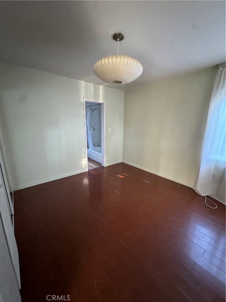 285 Garfield Avenue, Unit 3B Pasadena, CA 91101 - Photo 4 of 8 a view of an empty room with a window