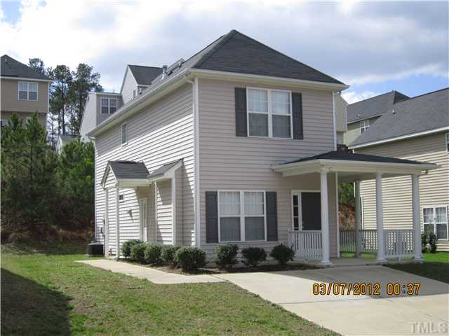5844 Forest Point Road Raleigh, NC 27610 - Photo 1 of 4 a front view of a house with a yard
