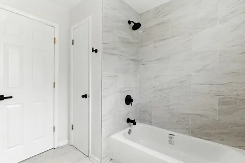 a bathroom with a bathtub