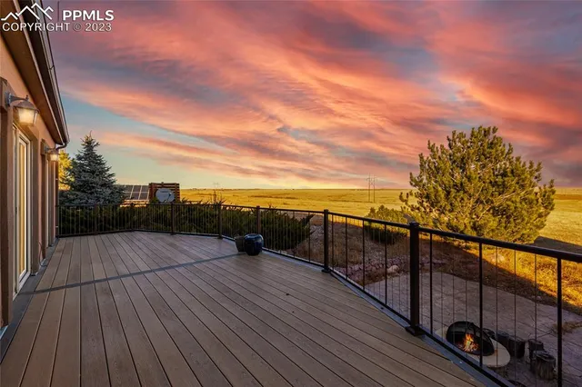 a view of outdoor space with wooden deck