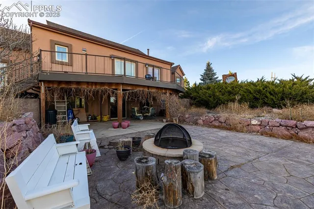 a view of a terrace with a garden
