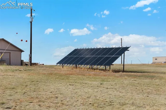 a view of a lake with a big yard