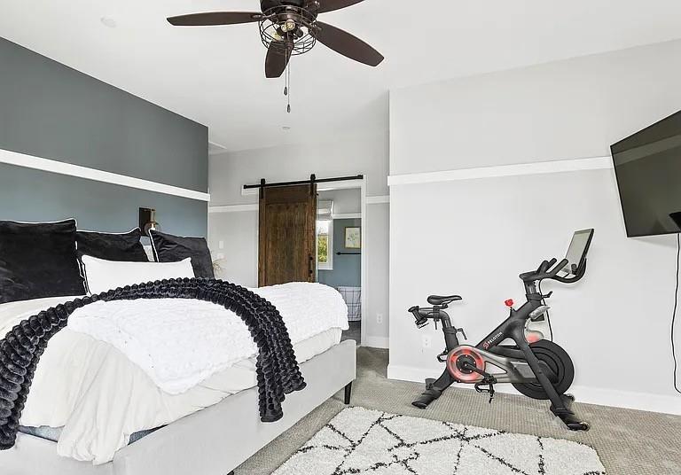 1905 Galt Cmns Kennesaw, GA 30144 - Photo 13 of 28 a bedroom with a bed and wooden floor