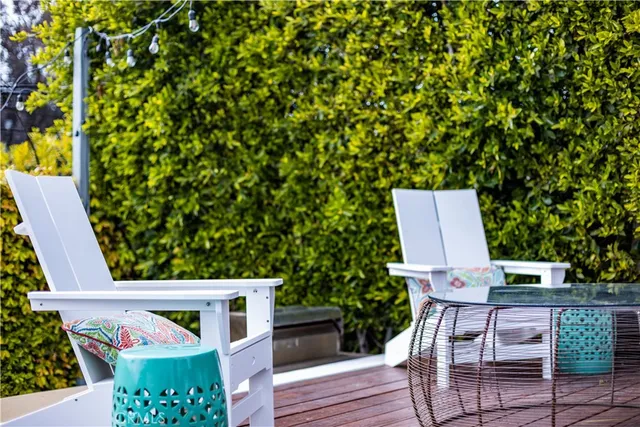 a kitchen with a sink a stove and cabinets