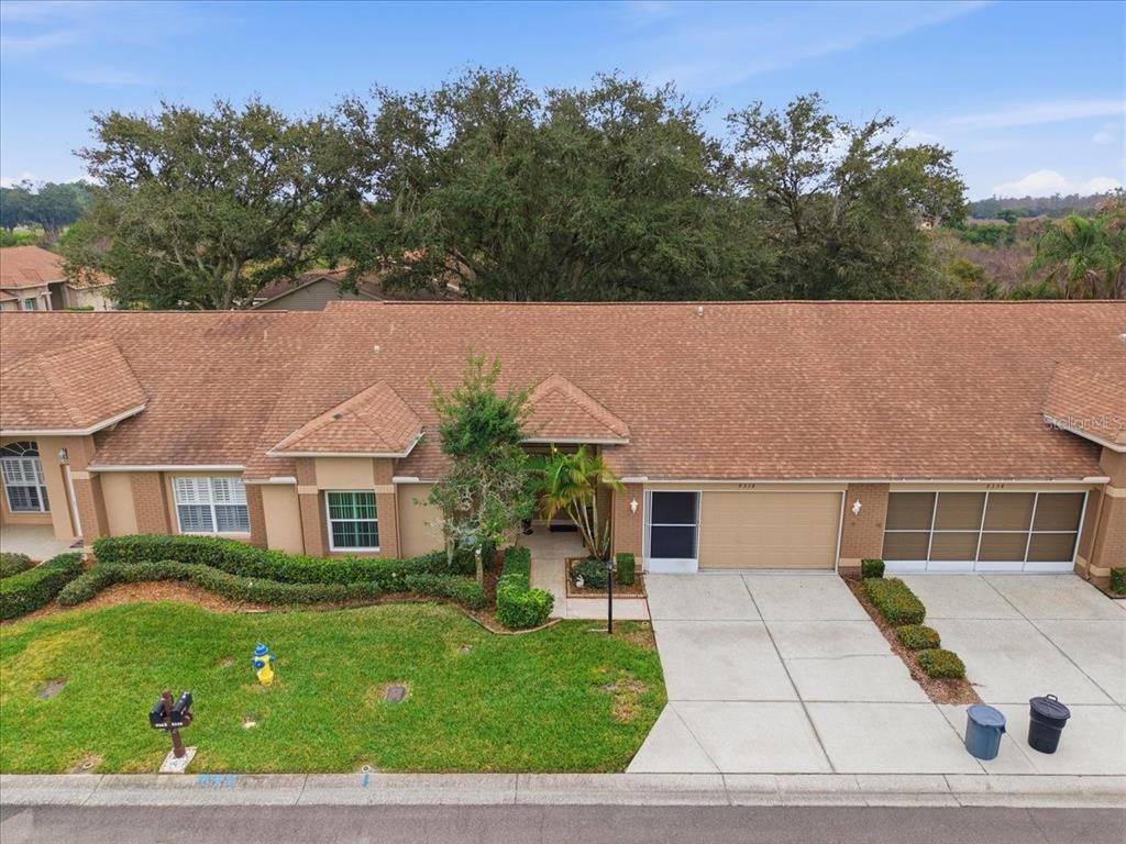 9338 Clearmeadow New Port Richey, FL 34655 - Photo 44 of 54 front view of a house with a yard