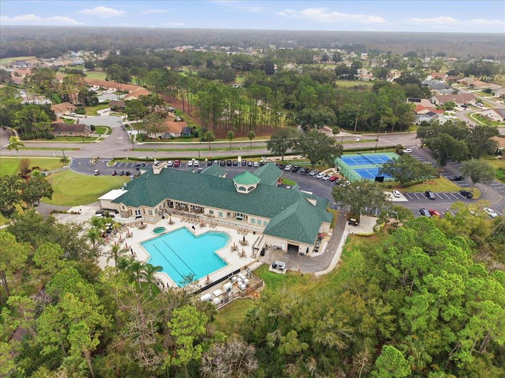 9338 Clearmeadow New Port Richey, FL 34655 - Photo 49 of 54 an aerial view of residential houses with outdoor space and river