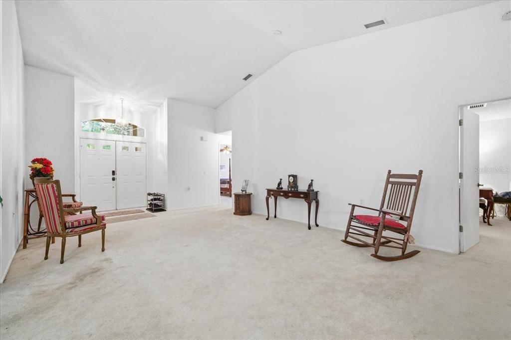 9338 Clearmeadow New Port Richey, FL 34655 - Photo 6 of 54 a room with furniture and air hockey table