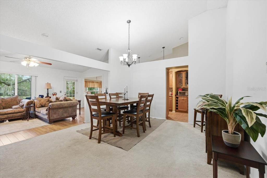 9338 Clearmeadow New Port Richey, FL 34655 - Photo 10 of 54 a dining room with furniture and window