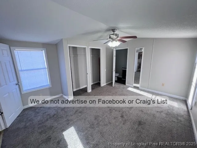 a view of a bathroom with a sink and a mirror