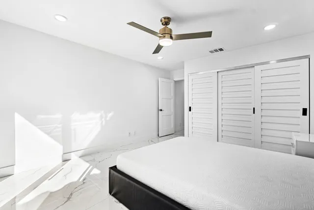 a view of kitchen with furniture and floor to ceiling window