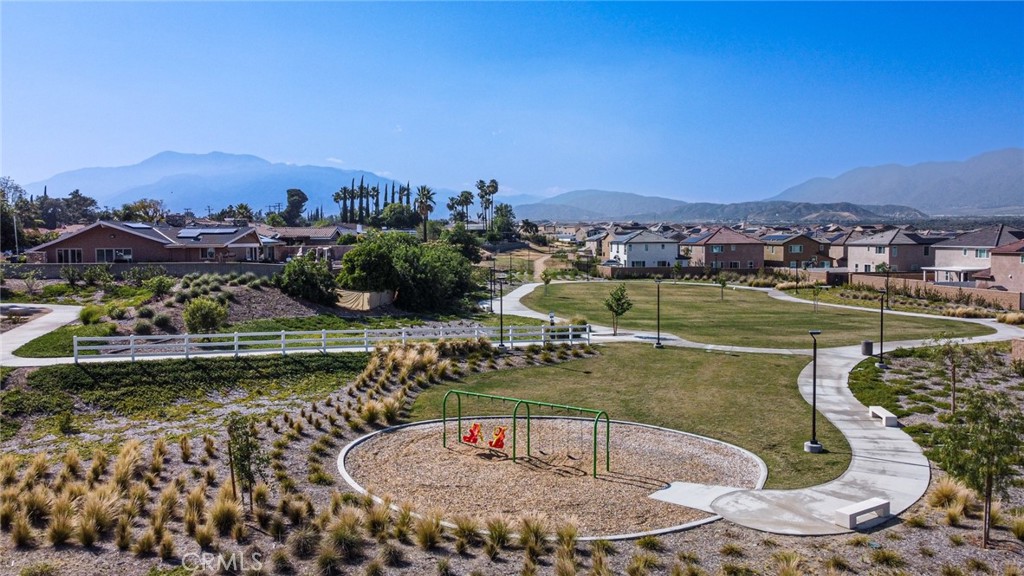 2448 Powell Drive Rialto, CA 92377 - Photo 15 of 30 a view of a swimming pool with a lake view and mountain view