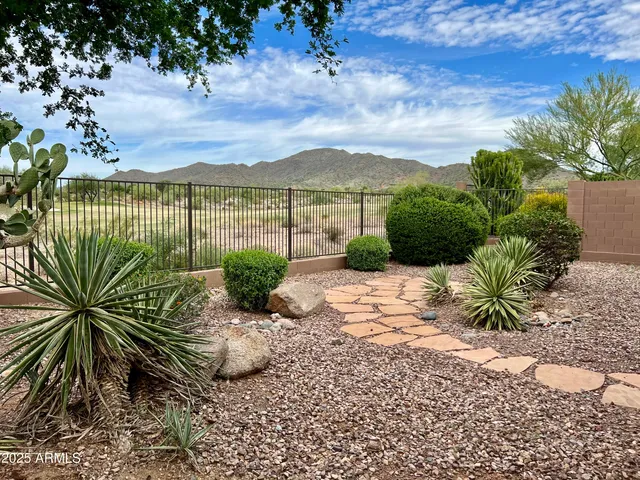 a view of a lake with a garden
