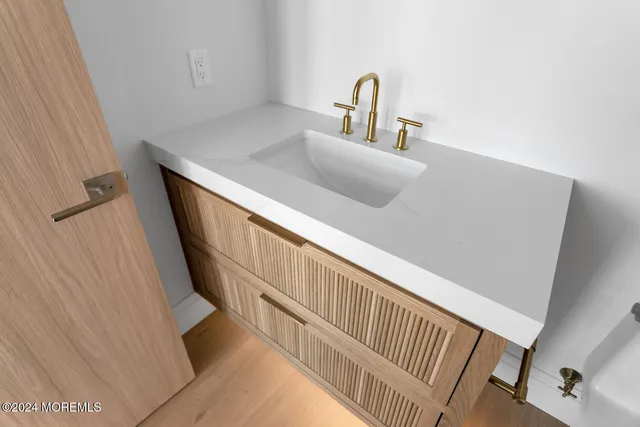 a view of an empty room with glass door