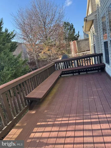 a view of balcony with wooden floor