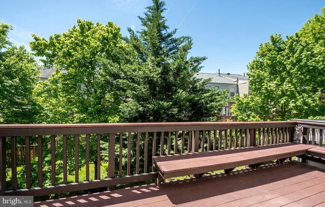 a view of a wooden roof deck