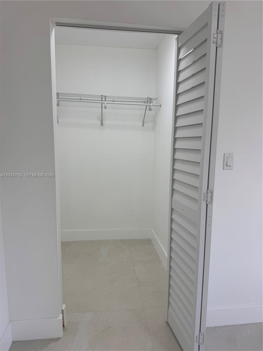 3305 Southwest 28th Street, Unit 3305 Miami, FL 33133 - Photo 11 of 17 a view of closet