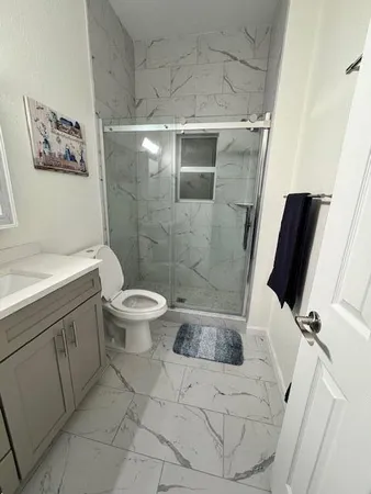 a bathroom with a sink and a toilet