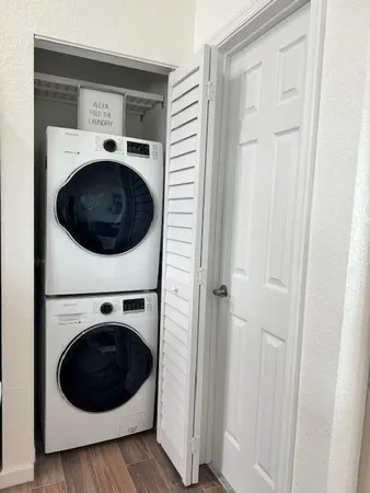 a utility room with dryer and washer