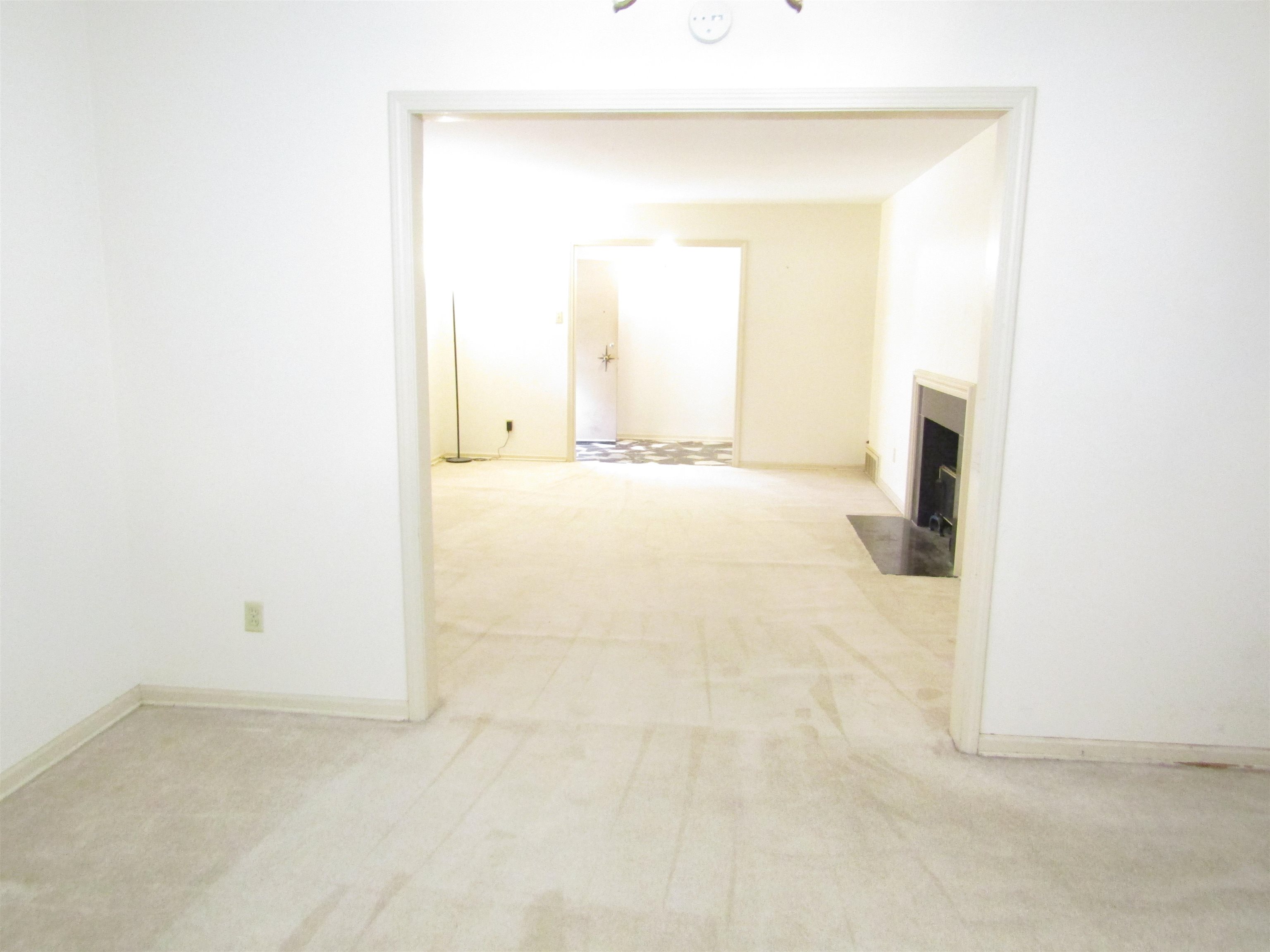 244 South Grove Park Road Memphis, TN 38117 - Photo 8 of 16 a view of an empty room with wooden floor