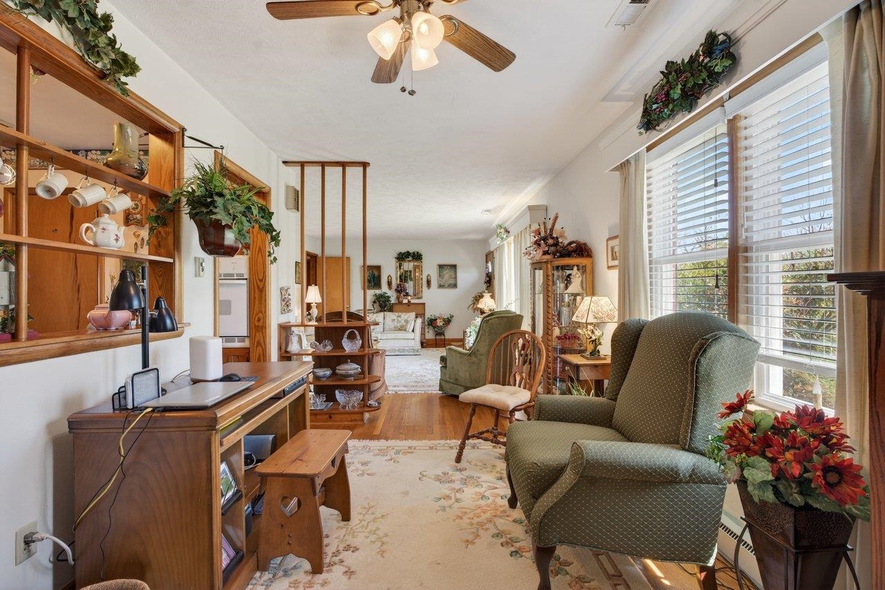 9625 Town Hall Road McGaheysville, VA 22840 - Photo 12 of 65 a living room with furniture and a large window