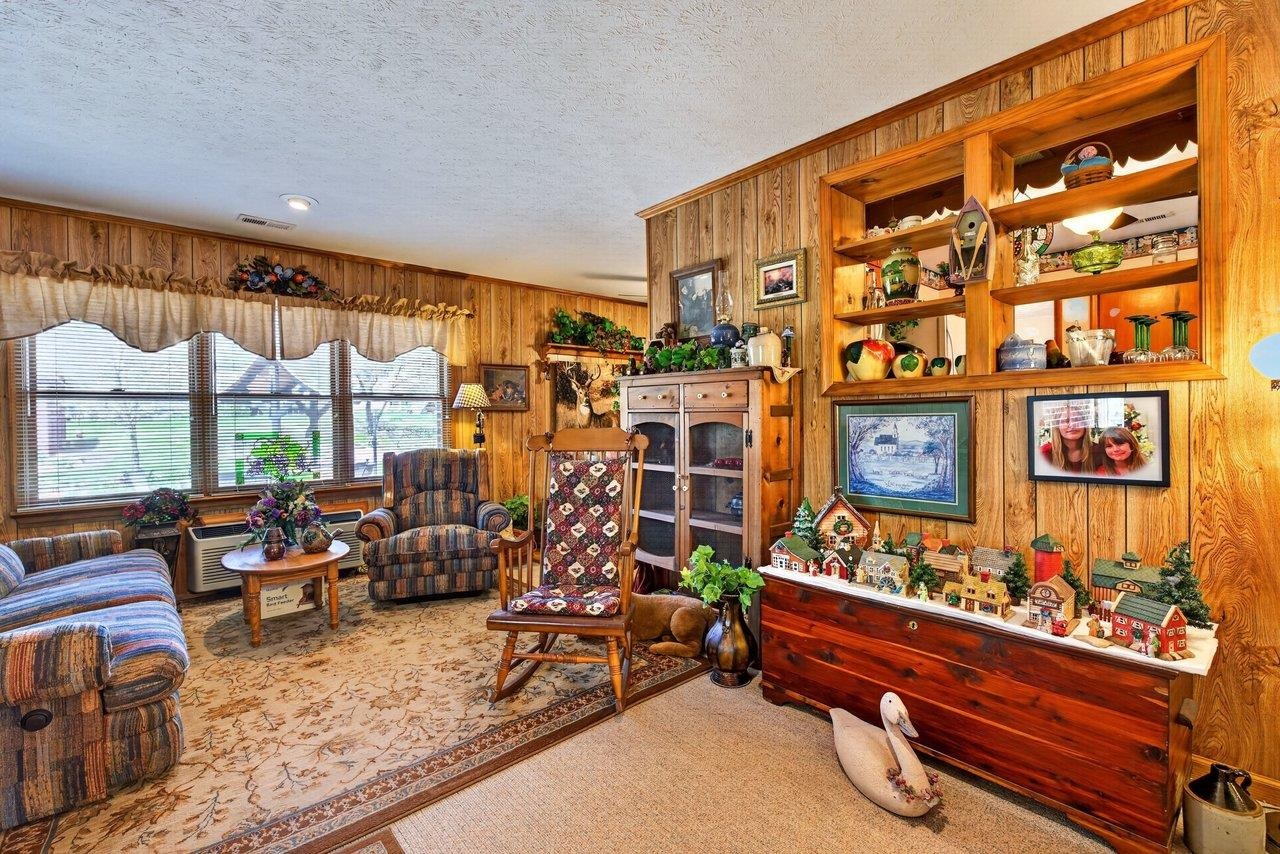 9625 Town Hall Road McGaheysville, VA 22840 - Photo 15 of 65 a living room with blue lights with furniture