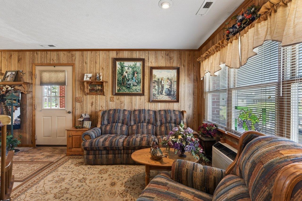 9625 Town Hall Road McGaheysville, VA 22840 - Photo 16 of 65 a living room with furniture and a large window