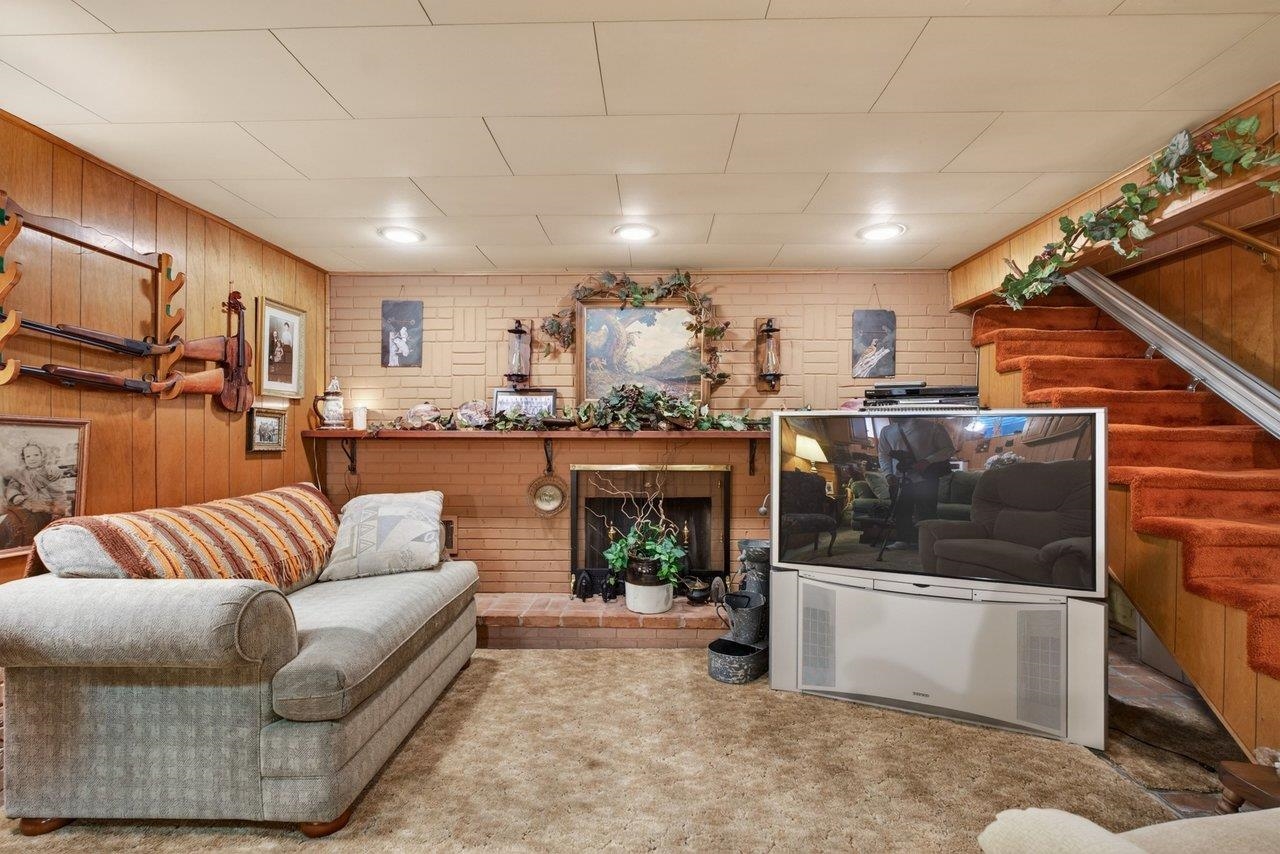 9625 Town Hall Road McGaheysville, VA 22840 - Photo 44 of 65 a living room with furniture and a fireplace