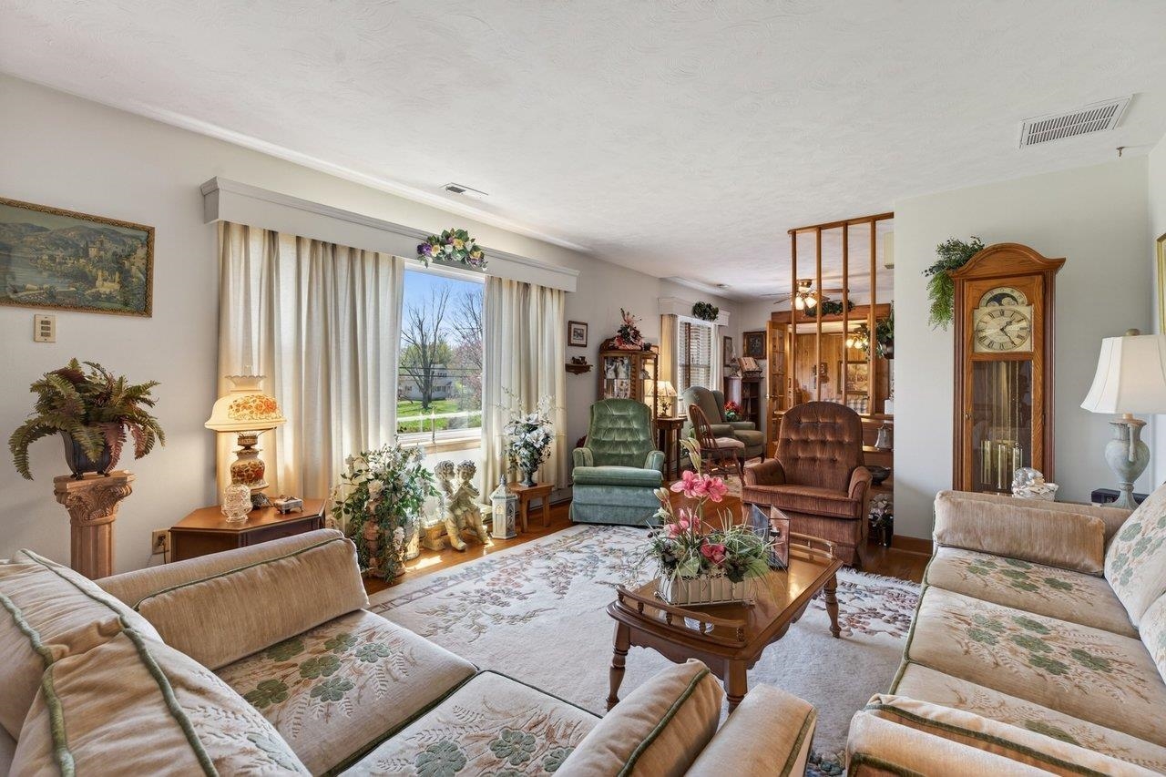 9625 Town Hall Road McGaheysville, VA 22840 - Photo 8 of 65 a living room with furniture and a large window