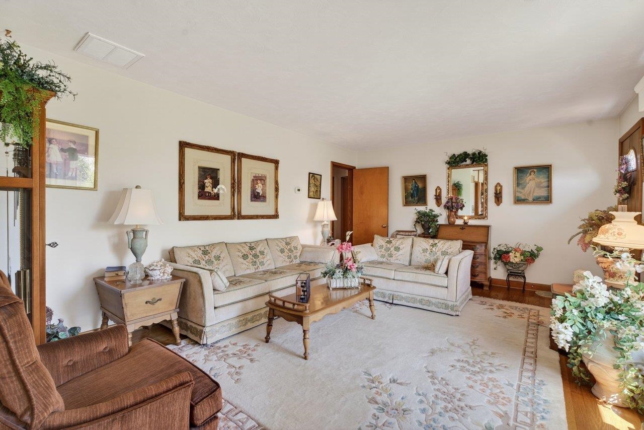 9625 Town Hall Road McGaheysville, VA 22840 - Photo 9 of 65 a living room with furniture and a painting on the wall